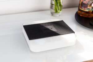 Acaia Pearl 2021 Scale on a counter, with sunlight hitting it.