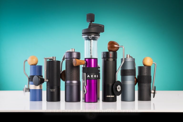 Nine manual grinders with a blue background.