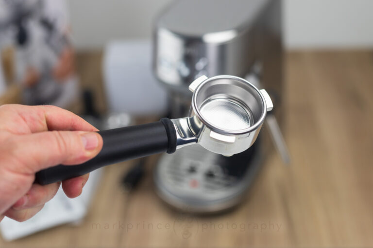 Made of aluminum (the box errors in saying it is stainless steel). Has the pressurized double basket installed.