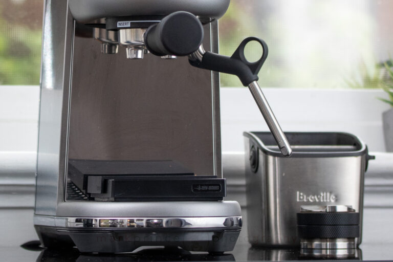 The cup clearance on this machine puts most Italian machines to shame. Check it with a scale in place.