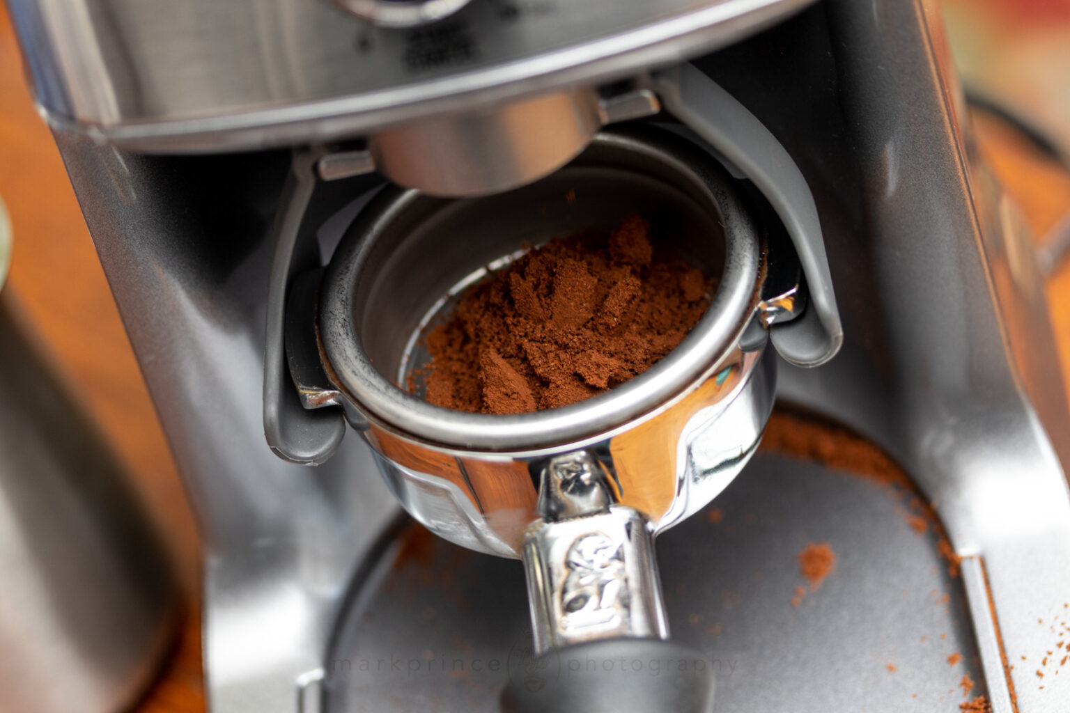 Using the Dose Control Pro as intended, grinding directly into a portafilter. Note the clumpy grind.