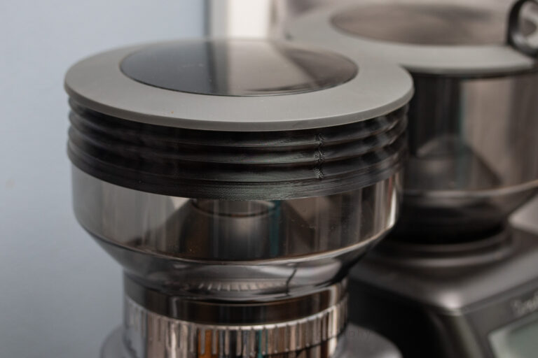 The Introvert Makes bellows is 3D printed, fits perfectly, and is around $22 US dollars. Excellent addition to this grinder.