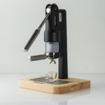 Superkop on its wood stand